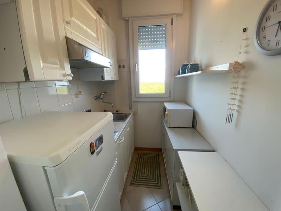 Appartamento Con Vista Panoramica E Piscina 利尼亚诺萨比亚多罗 外观 照片